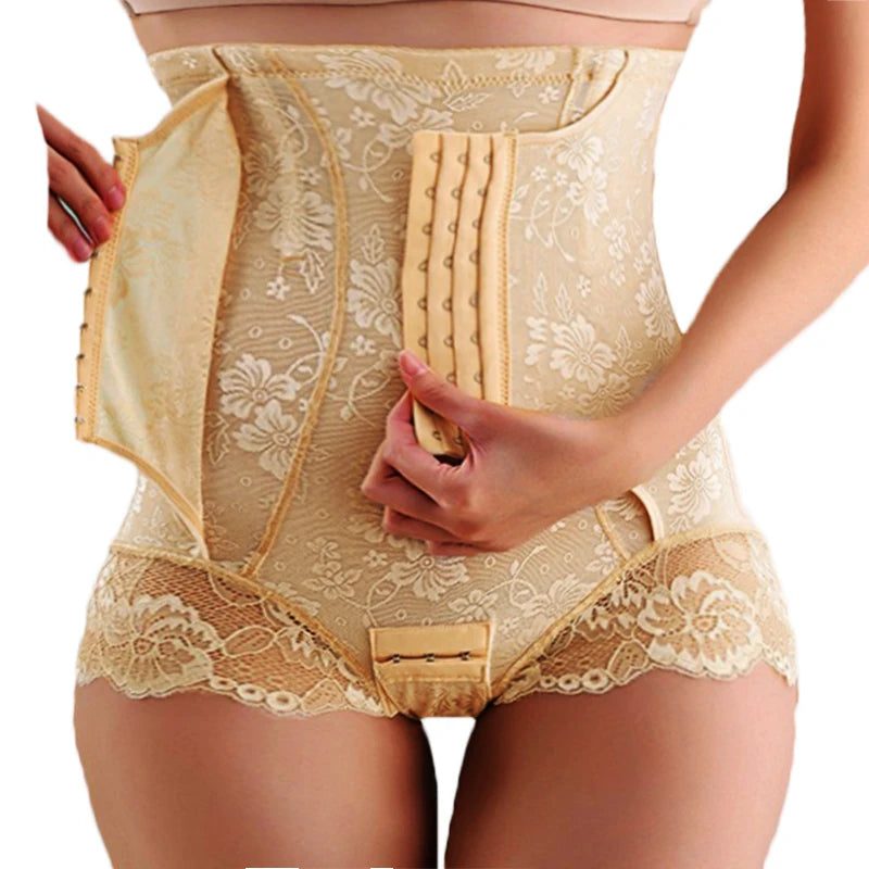 Beige shapewear with lace details held by a person on a white background