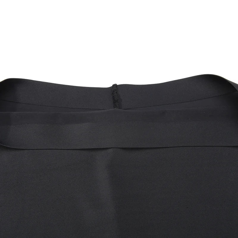 Close-up of a black fabric with a white background