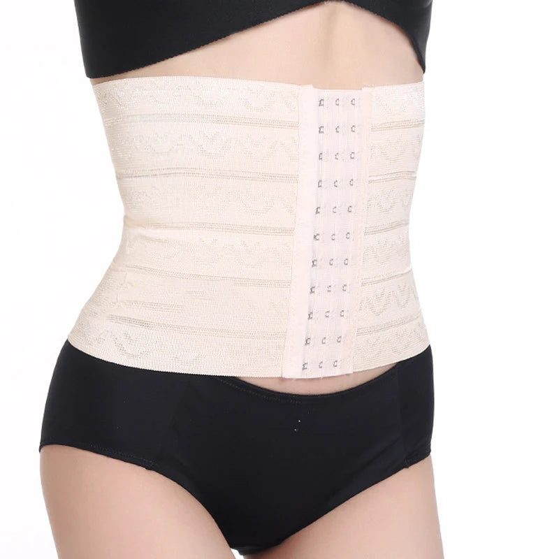 Beige waist trainer worn with black underwear on a white background