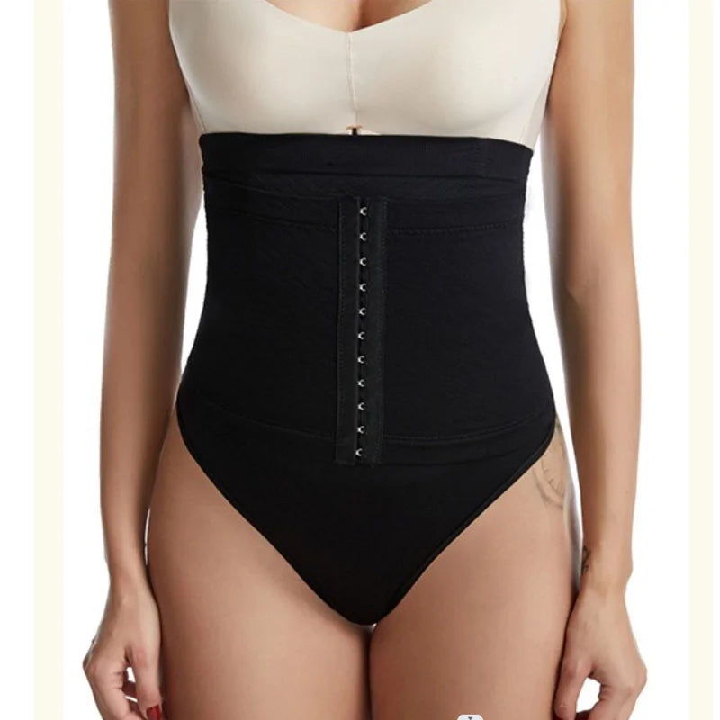 Black waist trainer worn by a model on a white background