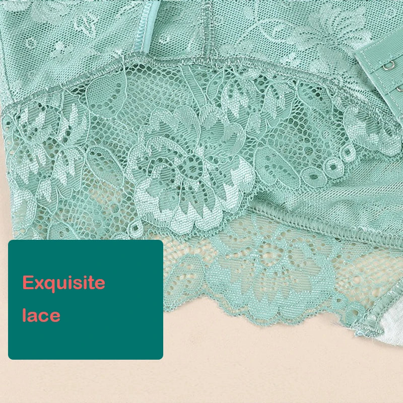 Close-up of teal lace fabric with a label indicating 'Exquisite lace' on a beige background.